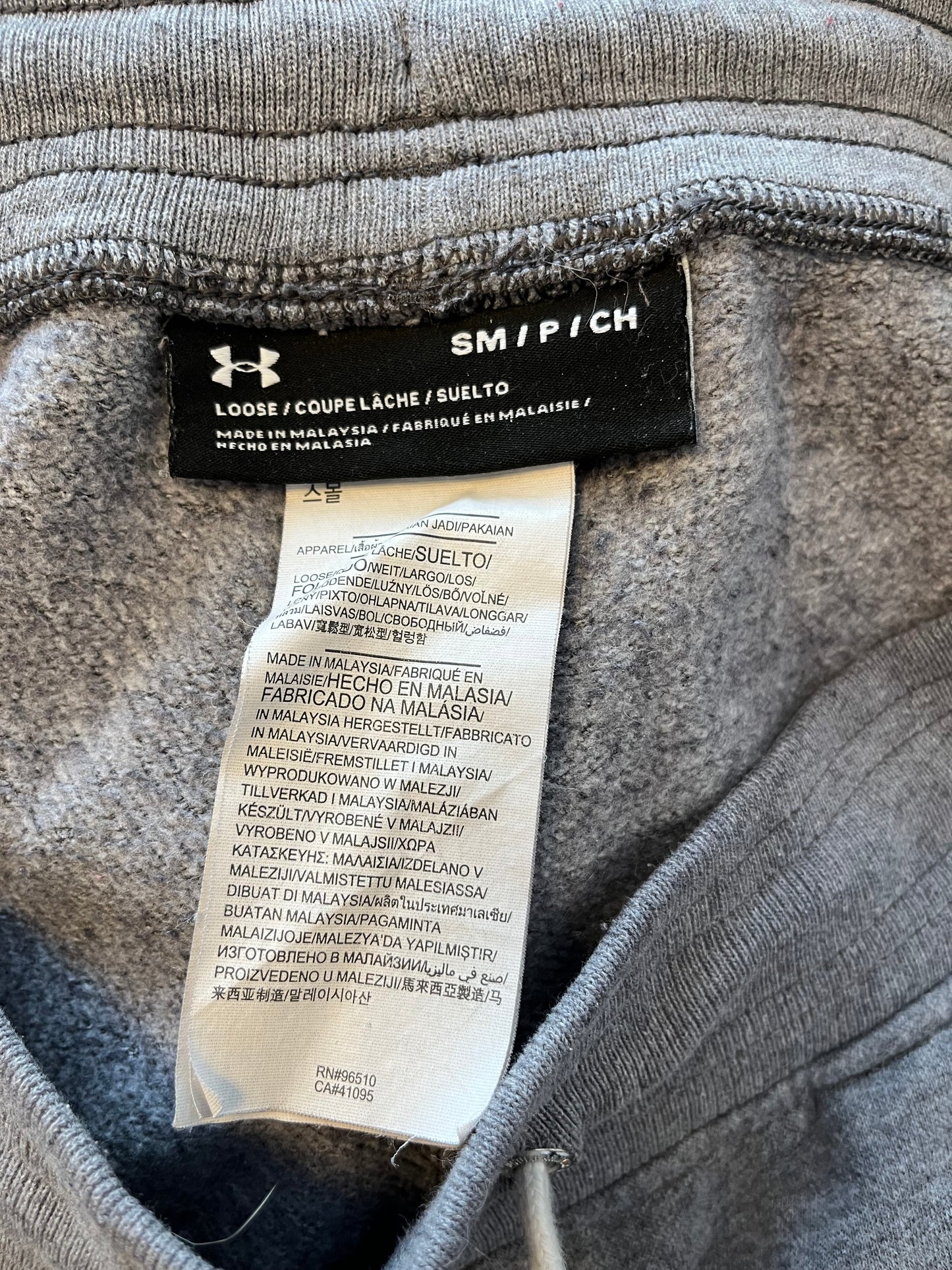 Joggings Under Armour - Étiquette de marque et de taille