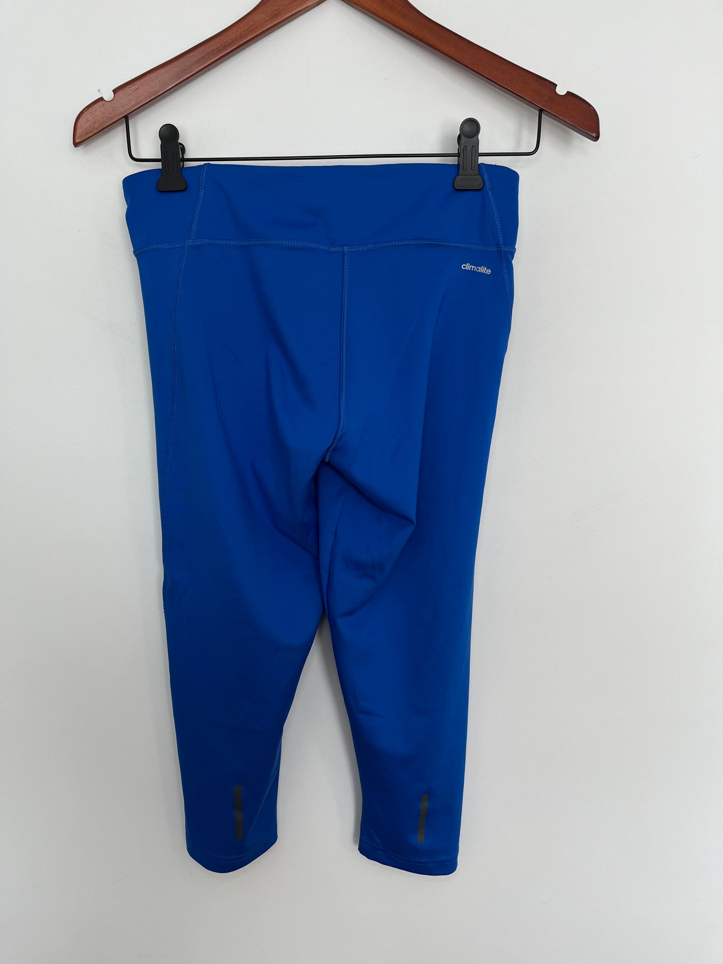 Leggings Adidas - Vue arrière sur fond blanc