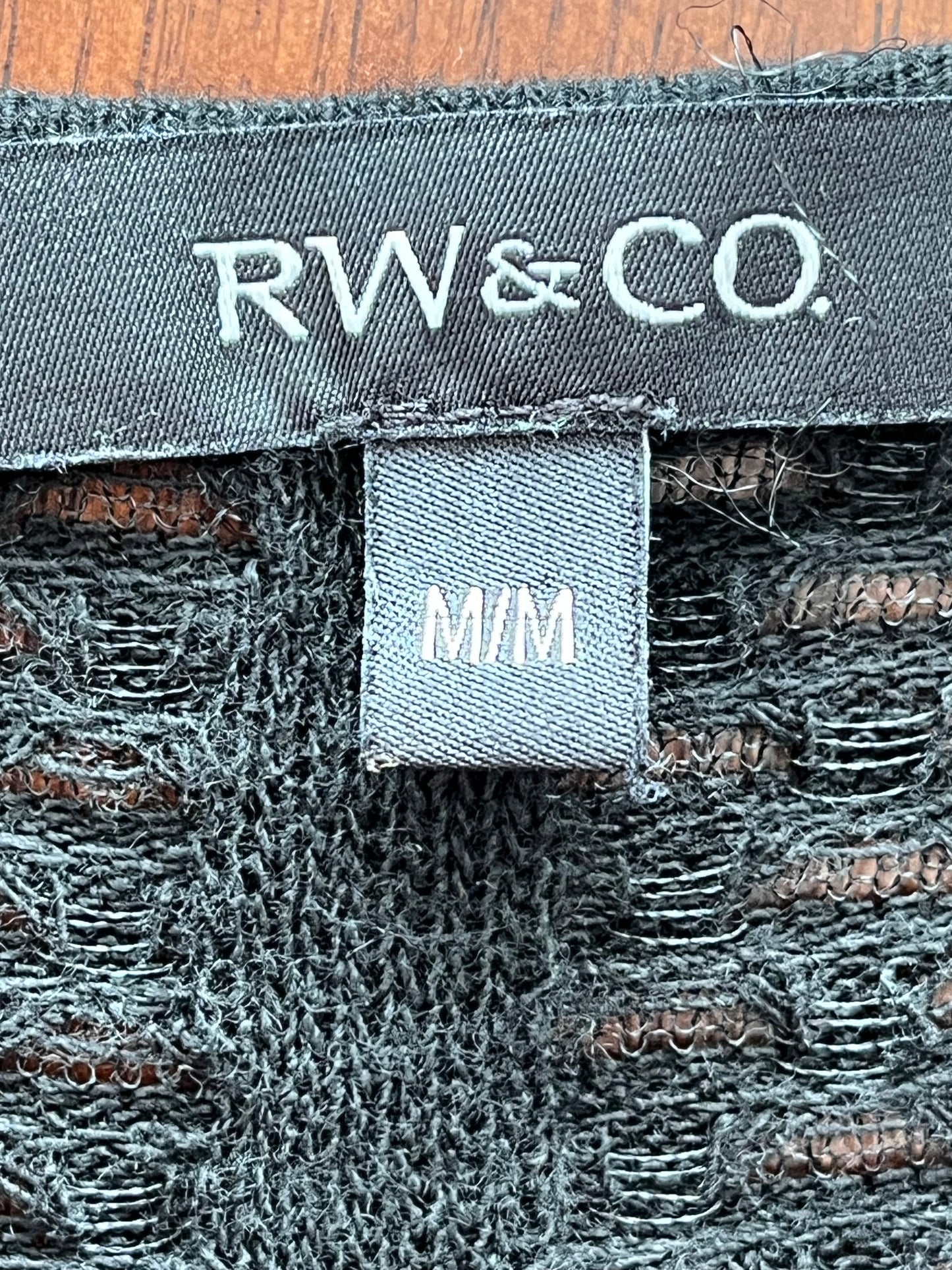 Veste RW&CO - Vue sur l'étiquette de marque et de taille