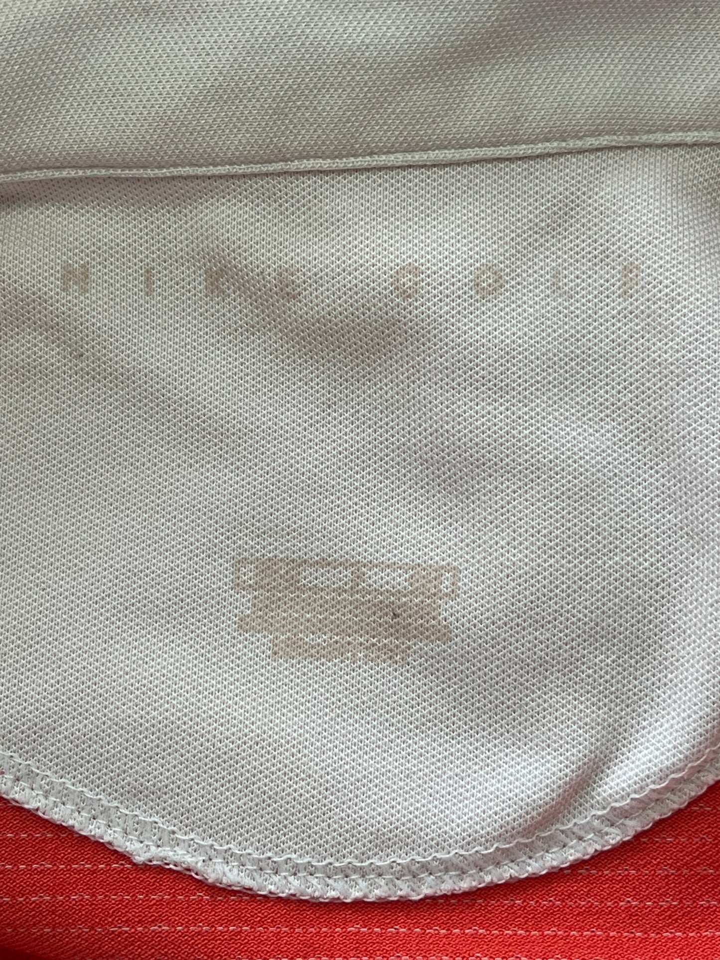 Polo Nike - Étiquette de marque et de taille