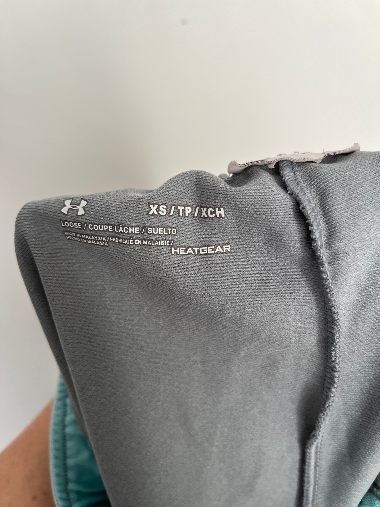 Short Under Armour - Étiquette de marque et taille