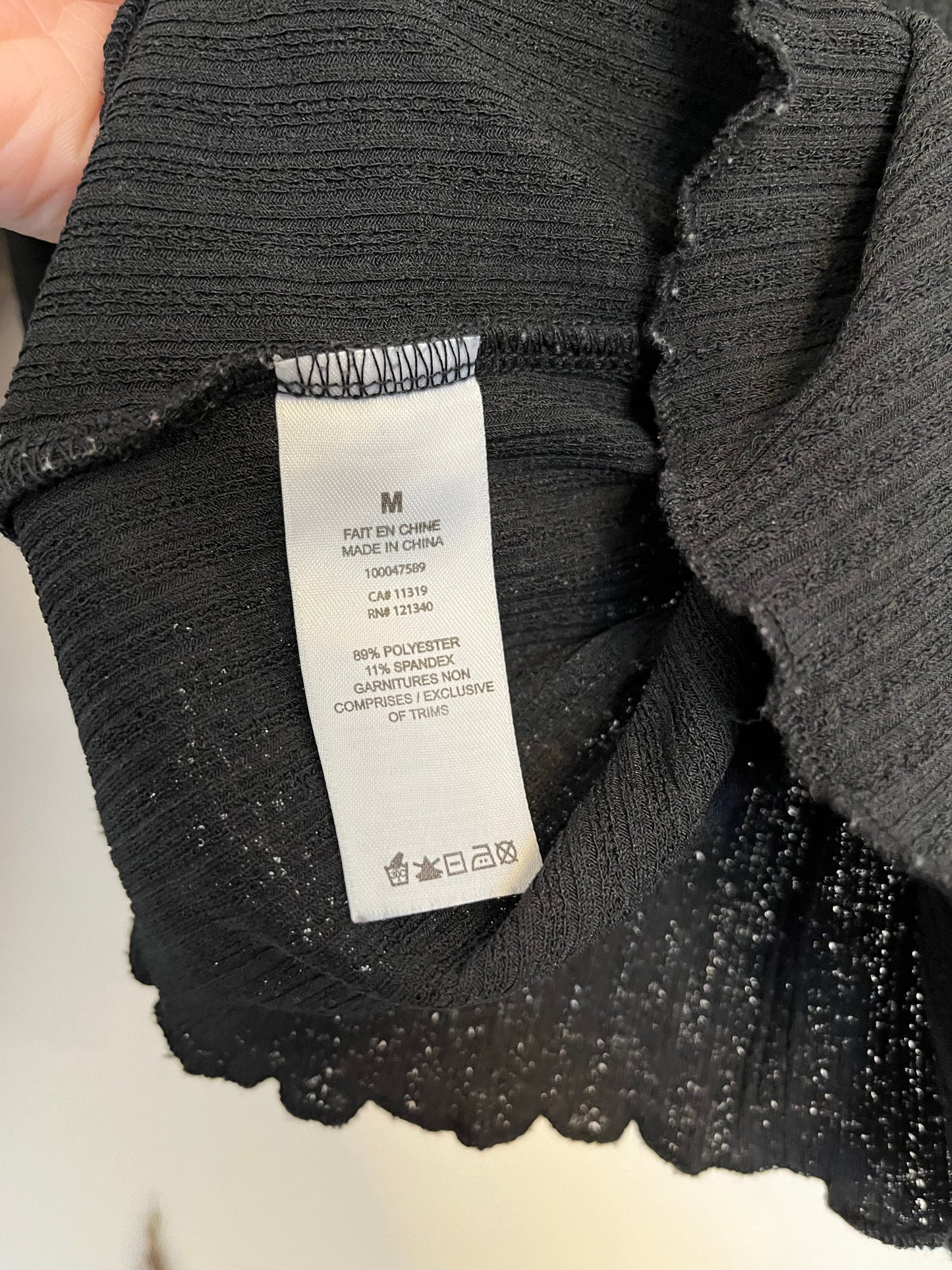 Chandail Dynamite - Vue sur étiquette de taille