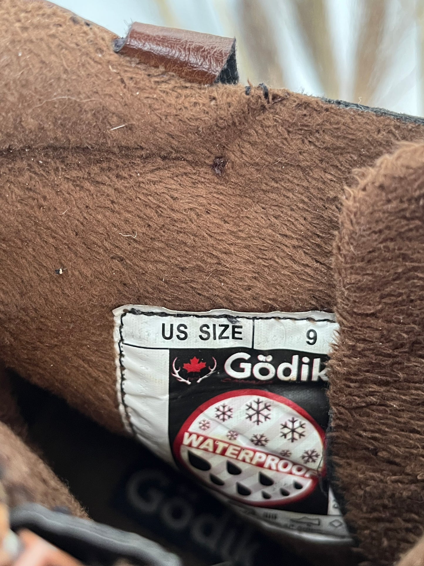 Bottes Godik - Vue sur l'étiquette de marque et de pointure