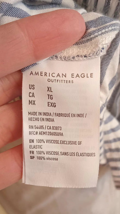 Camisole rayée blanc et bleu avec jolie boucle