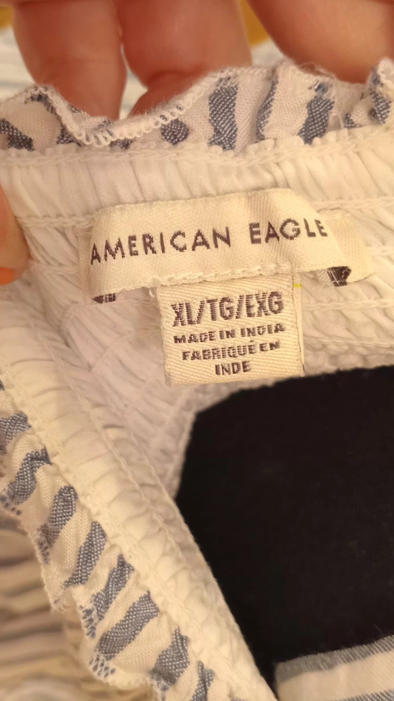 Camisole rayée blanc et bleu avec jolie boucle