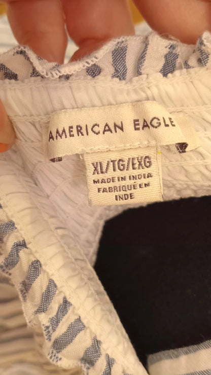 Camisole rayée blanc et bleu avec jolie boucle